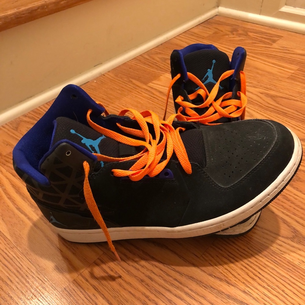 Nike Jordan’s black with turqoise Jordan symbol